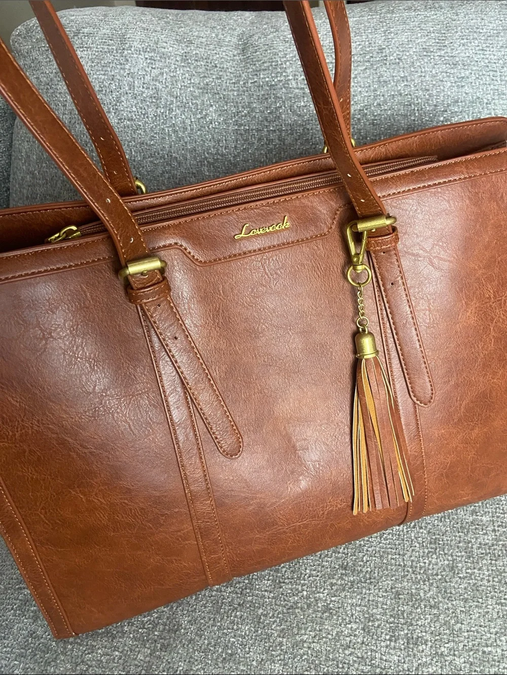 Leather-Textured Tan Tote with Tassel Accent for laptop work